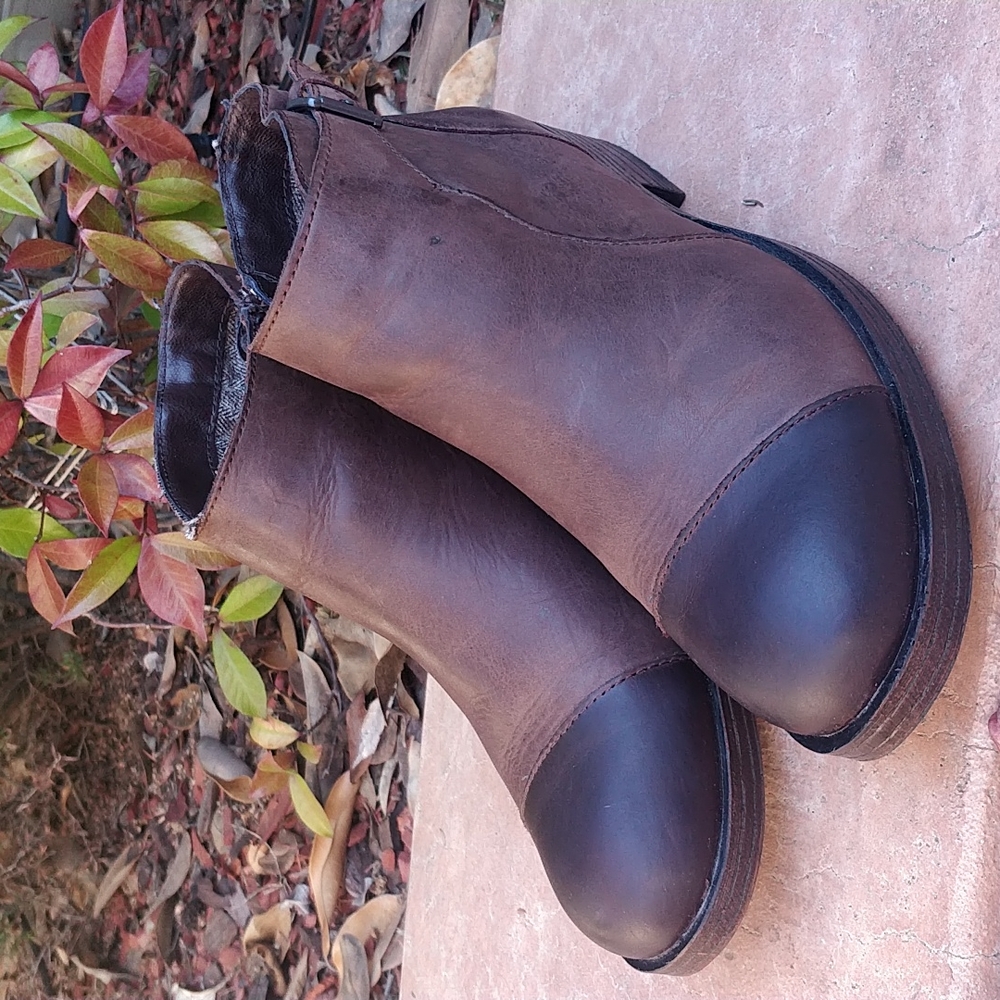 B.O.C Leather ankle boots with buckle accent.